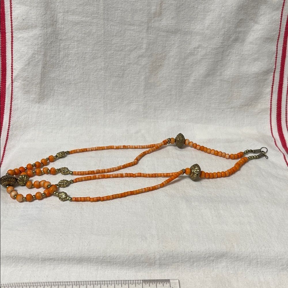 Vintage Orange Beaded Necklace with Gold Accents 14” long.